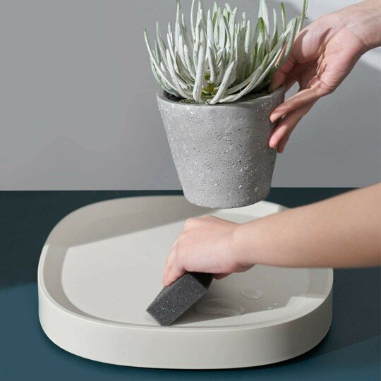 Plastic hidden wheeled tray plant stand